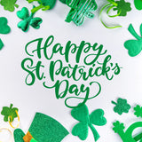 Green background with four leaf clovers showcasing Shamrock Accessories and Irish charm.