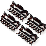 Essential Hair Claw Clips Set, 6cm - 4pcs on white surface