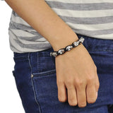 Adjustable Diamante Metal Gothic Skull Friendship Bracelet worn by a man