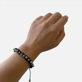 Adjustable Gothic Spike Stud Bracelet with skulls - ideal for punk, rock, emo styles.