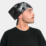 Dragon & sword print bandana - arafed man wearing black and white design