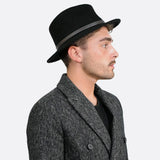 Man wearing Elegant Crushable Fedora with Leather Trim.