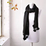 Faux Fur Pom Pom Pashmina Winter Scarf on Mannequin with Window Background