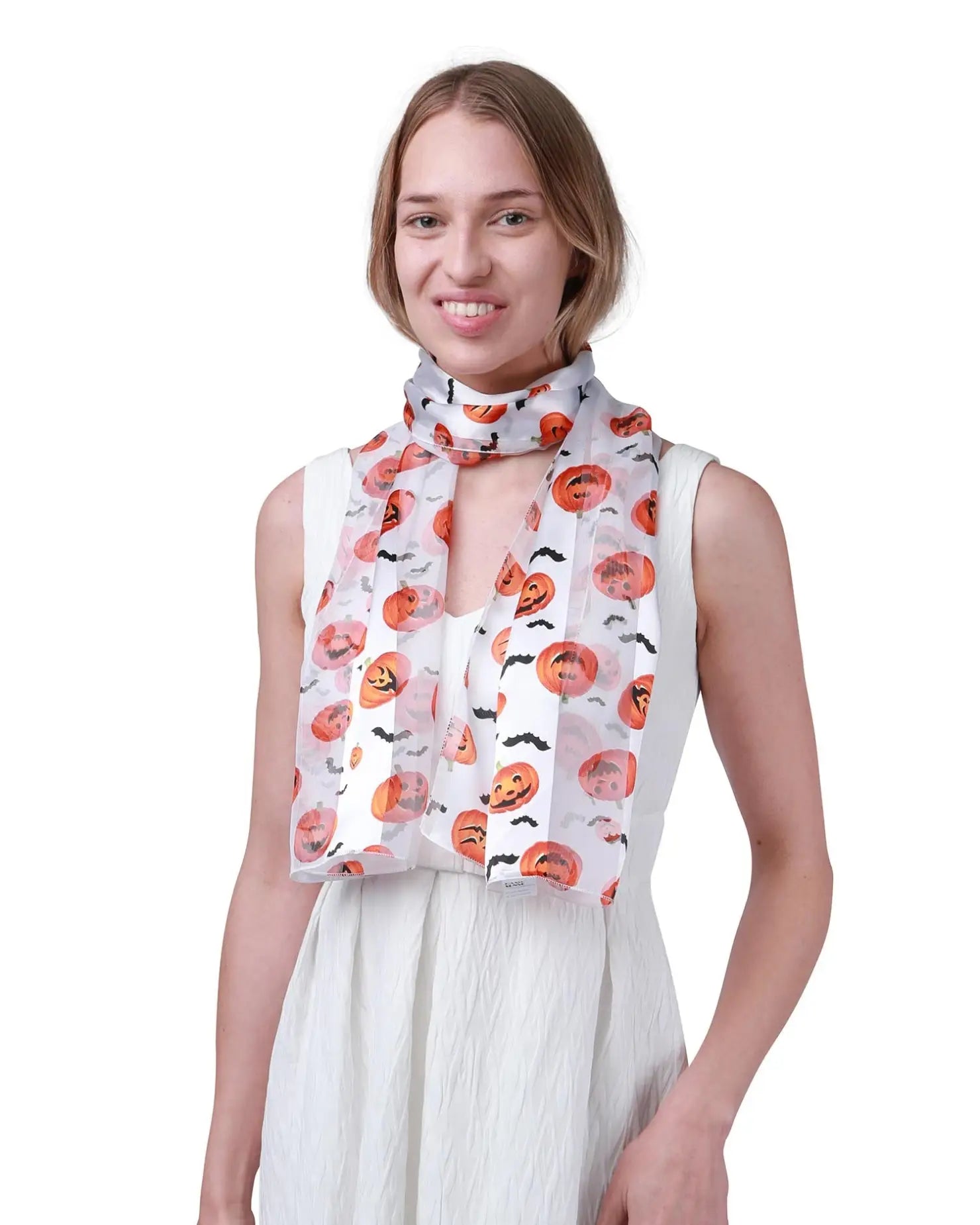 Woman wearing a white top with red and black pattern, Halloween Pumpkin & Bat Silky Satin Striped Scarf.