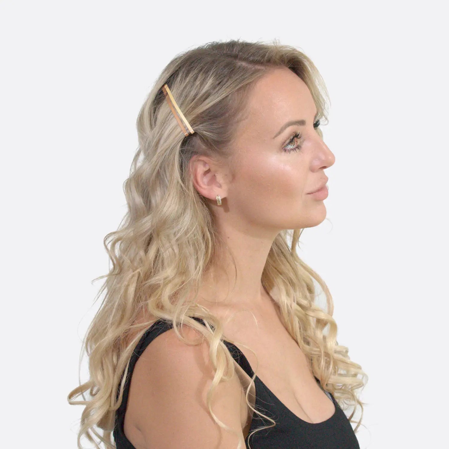 Blonde woman wearing black top with Jumbo Metal Bobby Pins.
