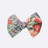 Floral print hair bow clip accessory with leopard design.