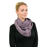 Woman wearing a purple pleated ribbed snood scarf