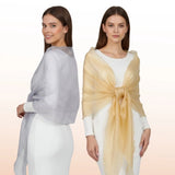 Two models wearing elegant sheer chiffon shawls. One silver grey wrap draped over shoulders and one champagne gold stole tied in a front knot. Lightweight shimmering wedding wraps for bridesmaids or evening gowns with delicate lettuce-edge hems.