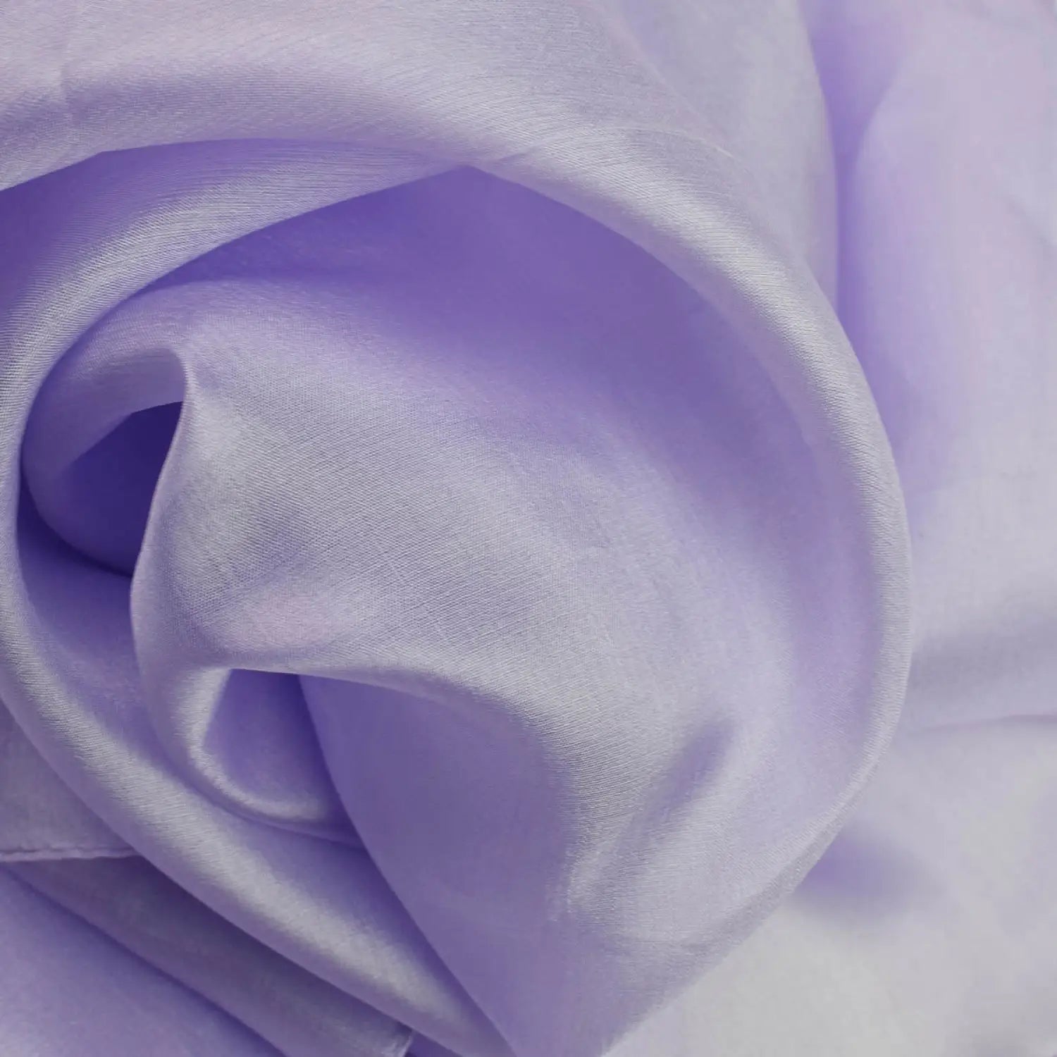 100% mulberry silk luxurious multiuse scarf in a close up of a purple fabric