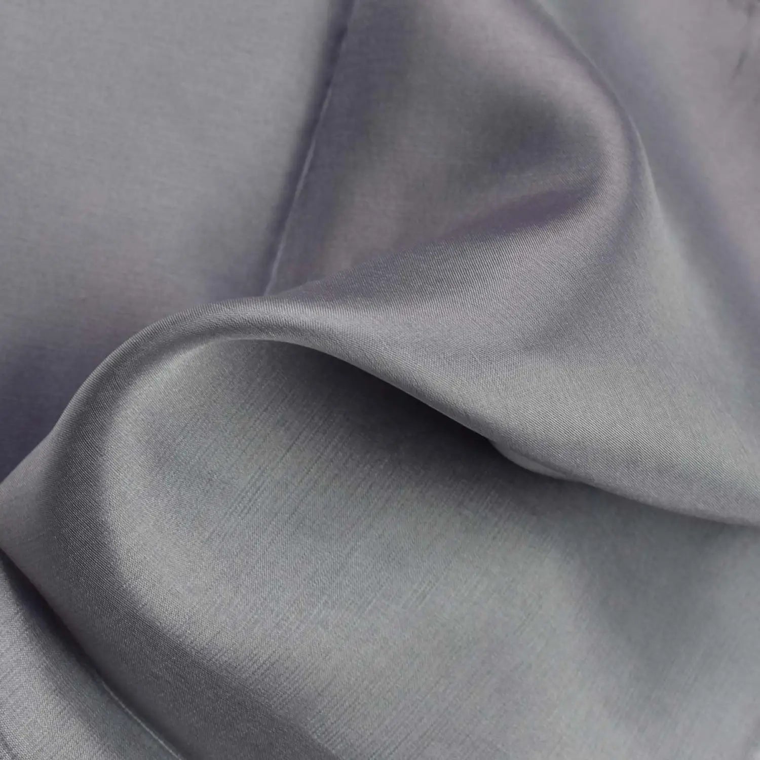 Close up of luxurious mulberry silk grey fabric multiuse scarf