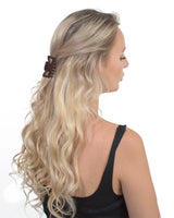 Woman with long blonde hair in Essential Hair Claw Clips Set - 4pcs.