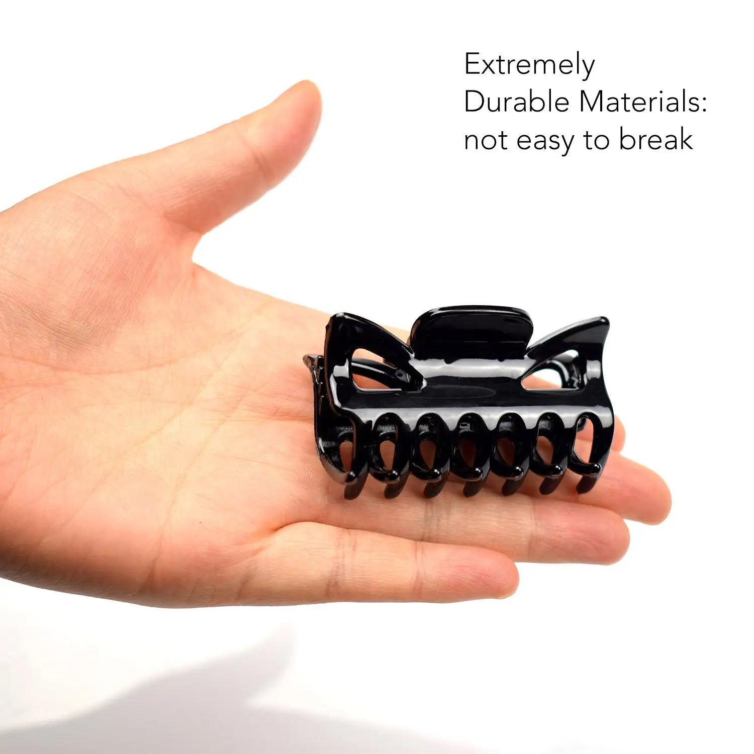 Essential Hair Claw Clips Set - Small black toy held in hand