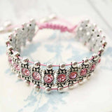 Pink and silver beaded bracelet with boho rhinestone and elastic bead design