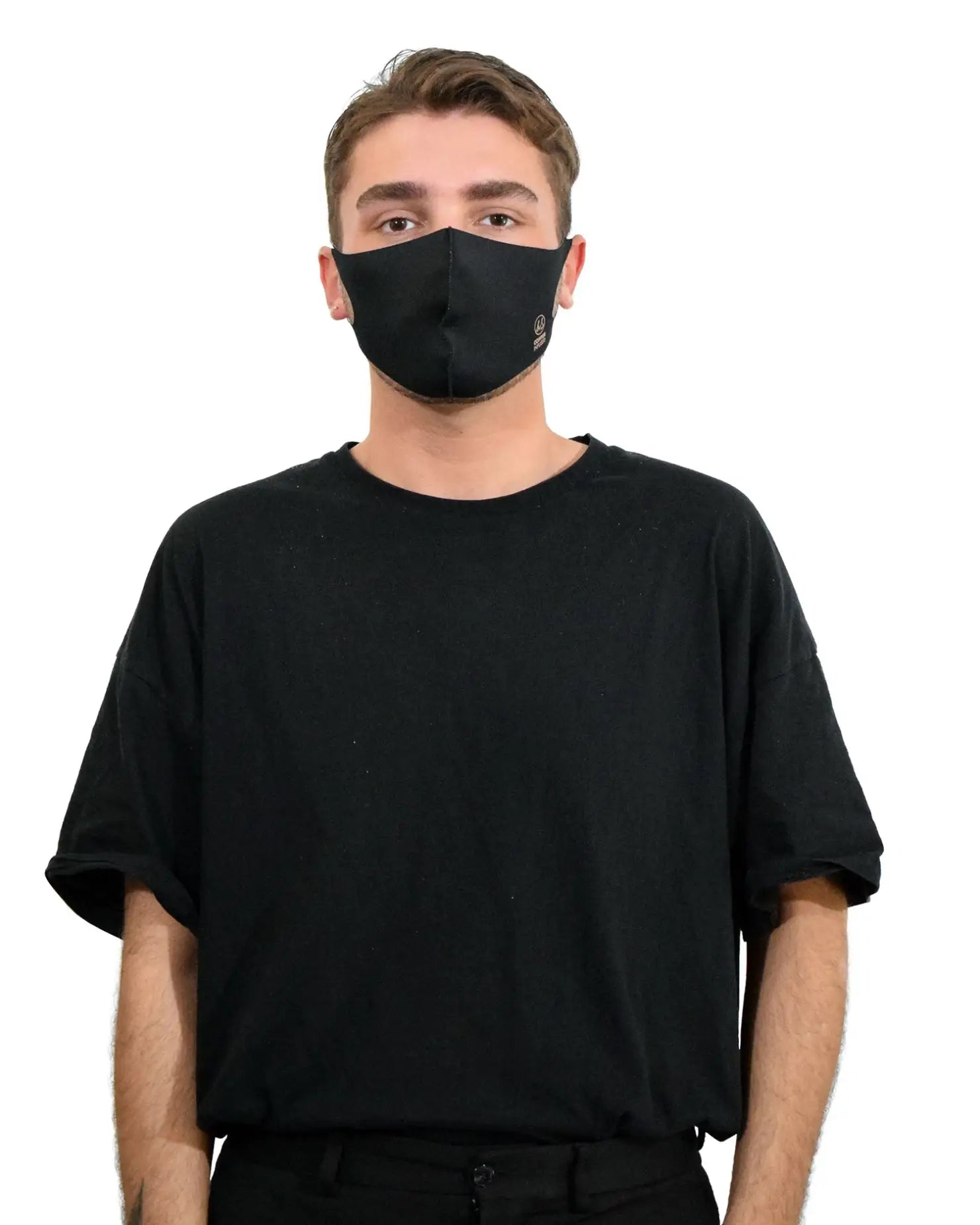 Man wearing black mask in 3D Copper-Infused Face Mask Covering for Stylish Protection.