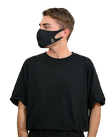 Stylish man in black copper-infused face mask