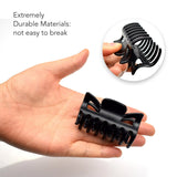 Essential Hair Claw Clips Set - Hand Holding Black Bike Handle