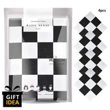 Close up of checkered pattern book in 4PCS F1 Racing Flag Chessboard Checkered Cotton Bandana Set.