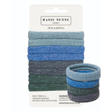 Blue and green washcloths stacked in the background of Active Hair Ties, seamless strong hold elastics for sports, 8pcs