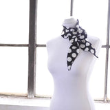 Polka Dot Satin Sash Scarf & Matching Hair Pin Set on mannequin with black and white polka print scarf.