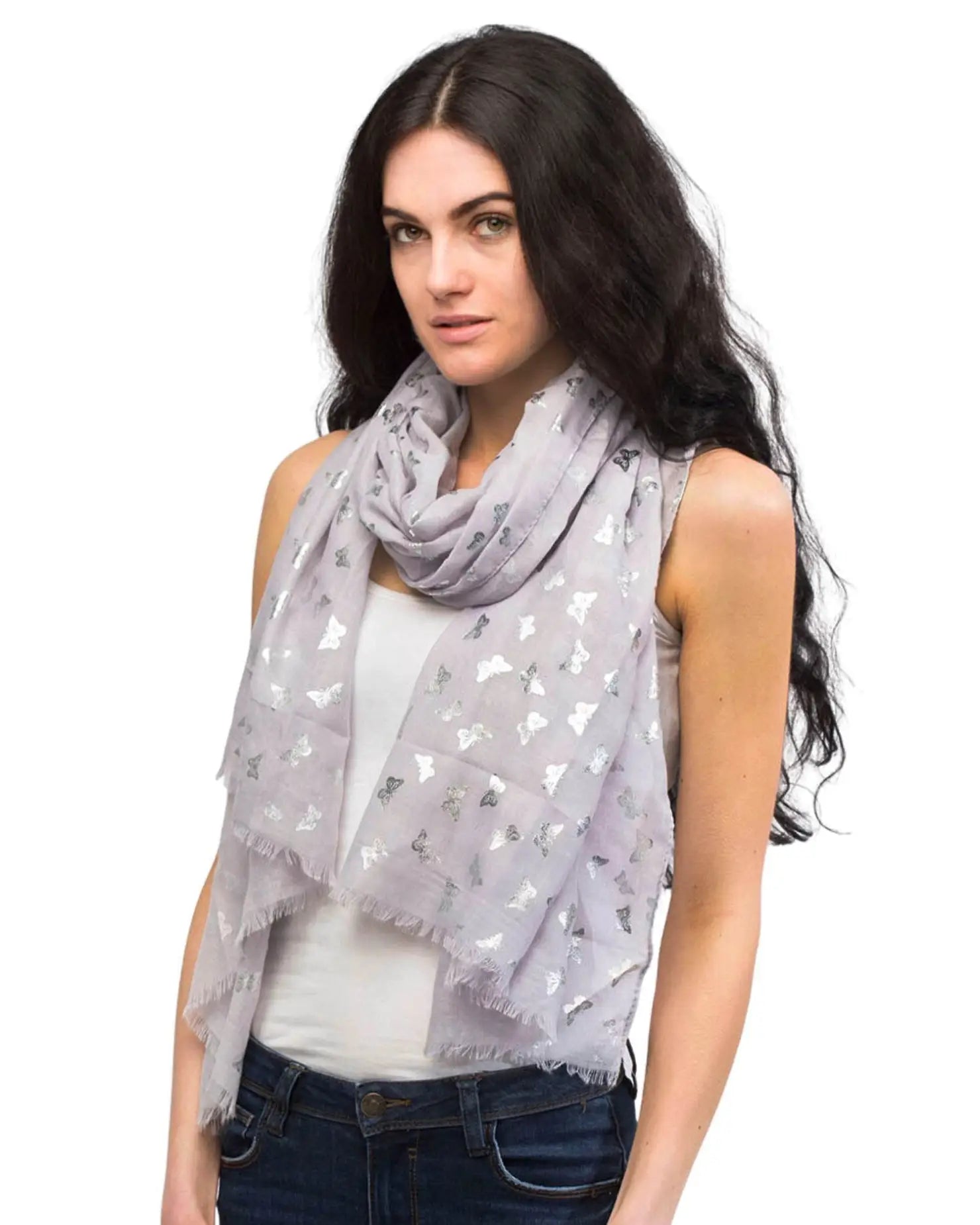 Woman wearing grey scarf with white stars in Butterfly Print Silver Foil Oversized Scarf