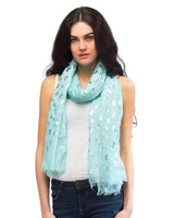 Woman wearing a Butterfly Print Silver Foil Oversized Scarf with blue scarf and white stars