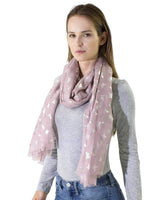 Woman wearing pink butterfly print oversized scarf with stars