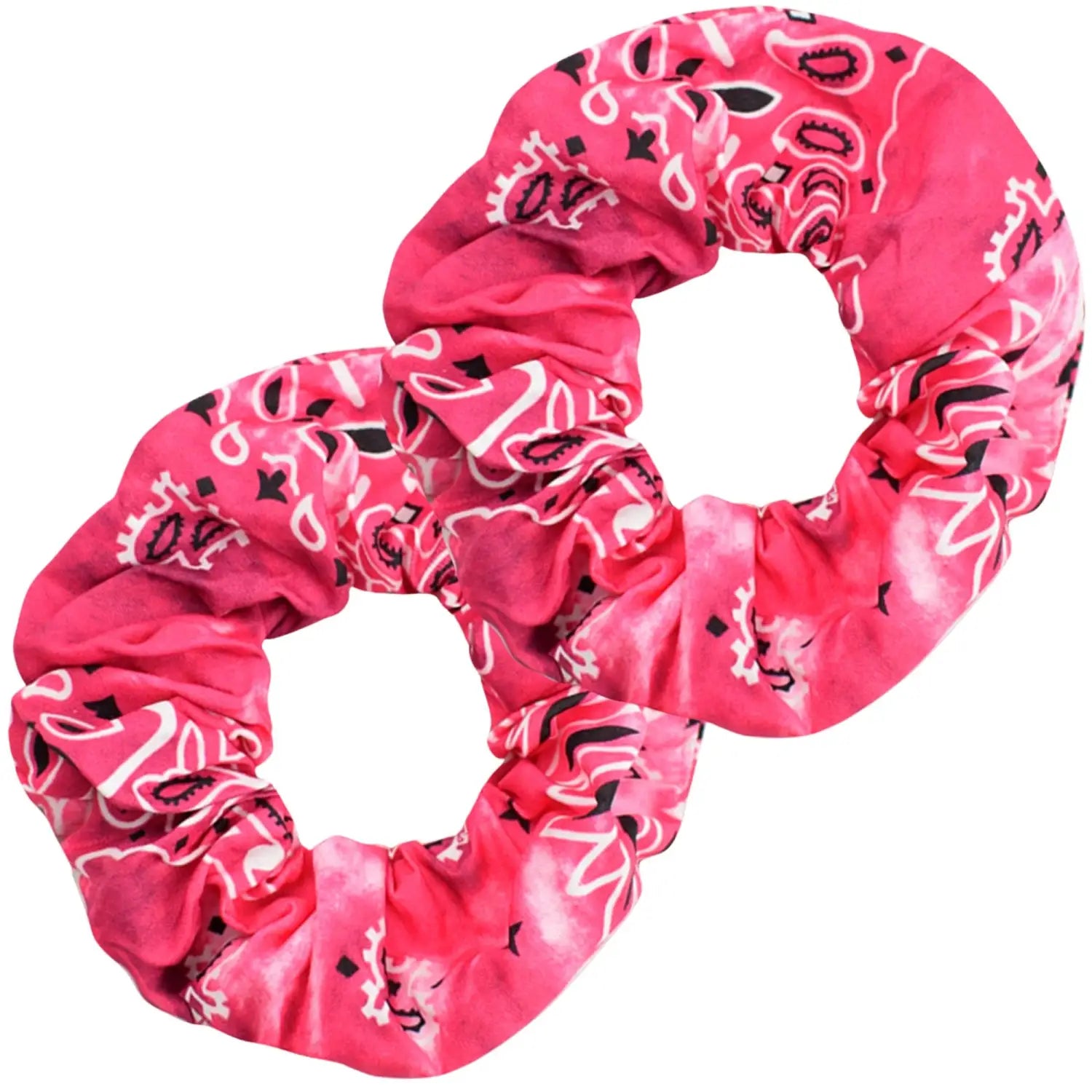 A close-up of a pink scrunchie with darker paisley patterns for girls with a pink princess dress for a gift in birthday