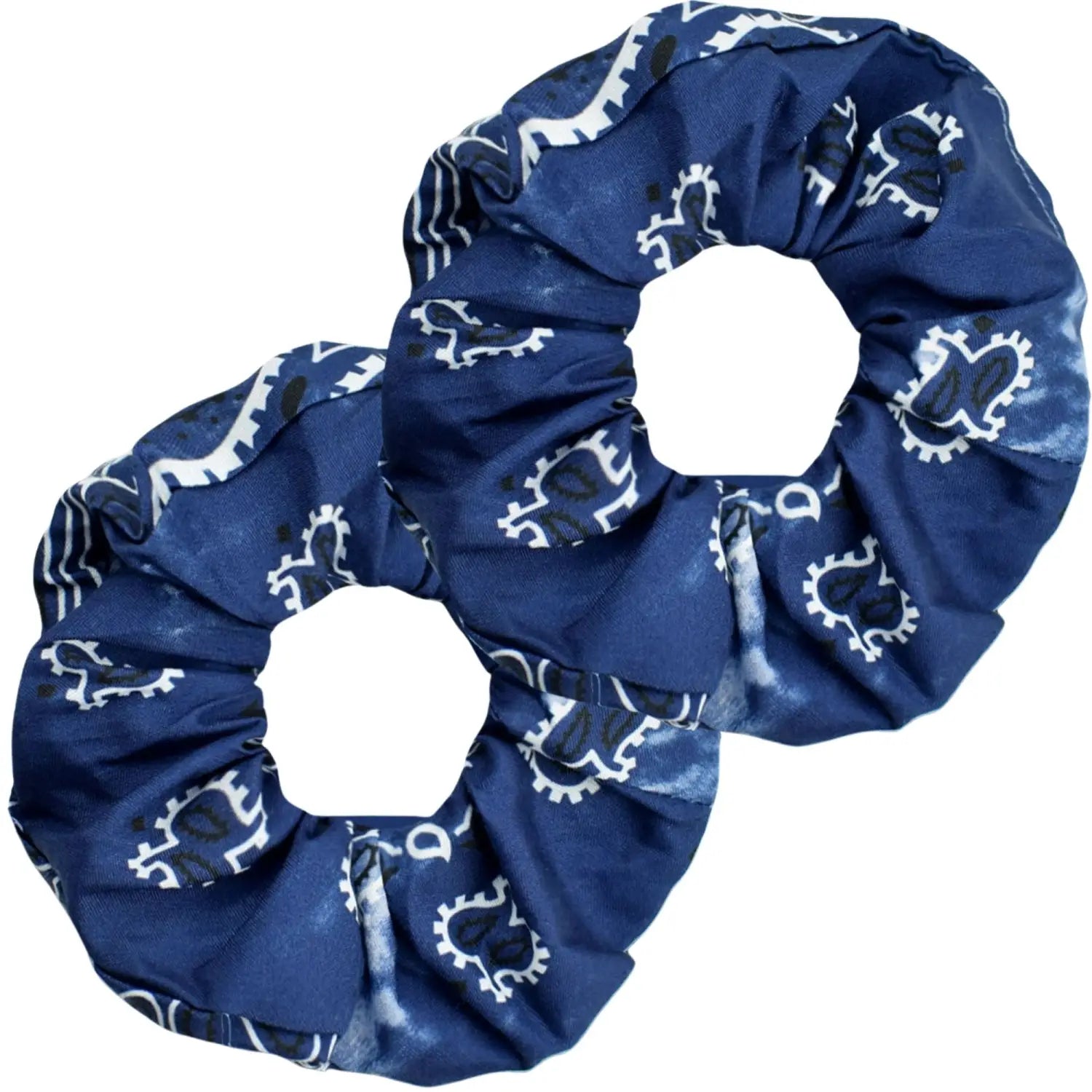 A close-up of a single dark navy blue scrunchie with white paisley patterns