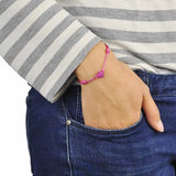 Woman wearing pink heart bracelet from Adjustable Diamante Ball Friendship Bracelet - Cotton Cord Design.