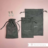 Grey linen bags and silver earrings accessory for Diamante Ball Friendship Bracelet.