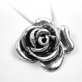 Antique Silver Rose Pendant on White Background