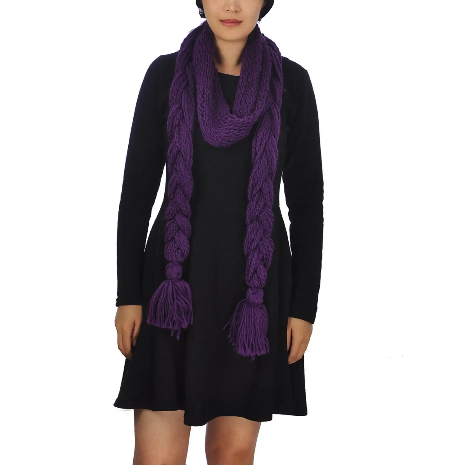 Woman wearing oversized long plait knitted scarf in purple