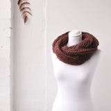 Soft knitted snood scarf on mannequin with brown scarf, Autumn Winter collection