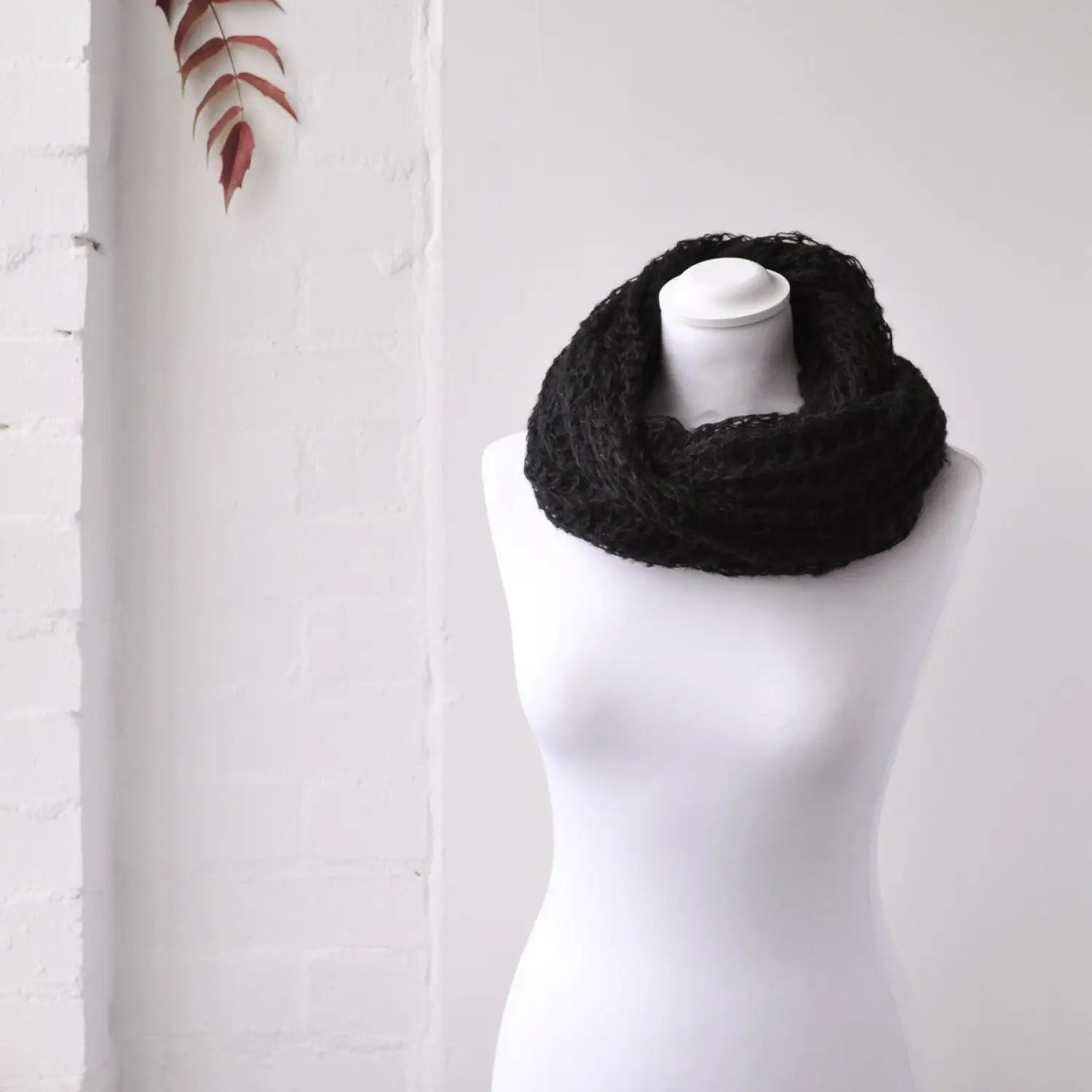 Close up of mannequin with soft knitted black scarf - Autumn Winter Snood Scarf