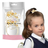 Girl holding white bag with gold flower - Beaded Hair Elastics for Kids pack of 2