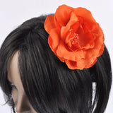 Bohemian 3D flower hair headband adorned with flower on woman’s head
