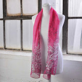 Pink bohemian floral chiffon scarf with white flowers.