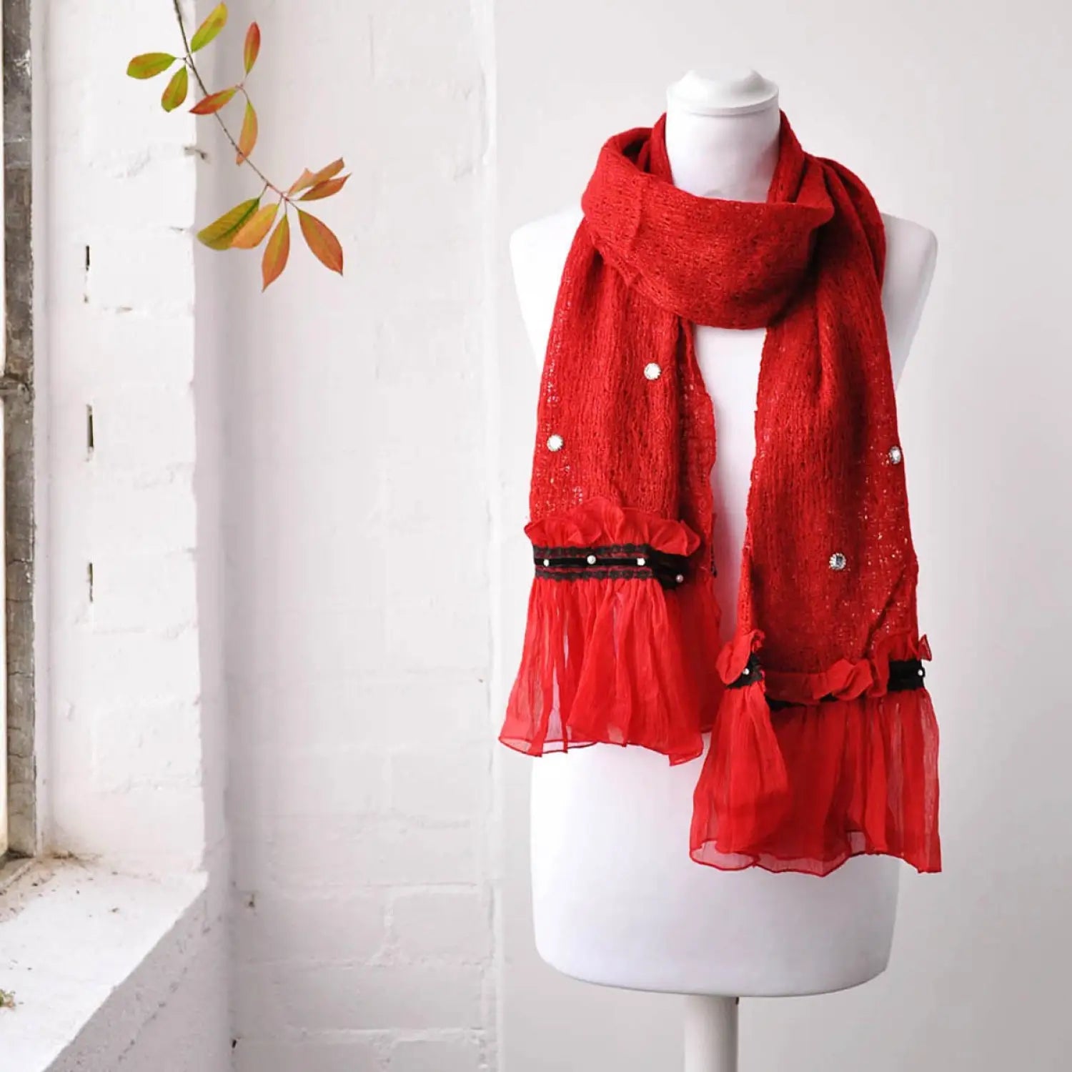 Bohemian retro ruffle red scarf displayed on mannequin