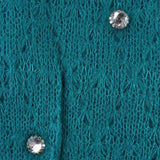 Close-up of green sweater with buttons from Bohemian Retro Ruffle Winter Knitted Frilled Maxi Scarf.
