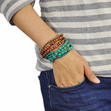 Layered summer holiday bracelet with woman wearing it.