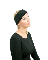 Woman wearing black bow-detailed knitted headband for Autumn & Winter.
