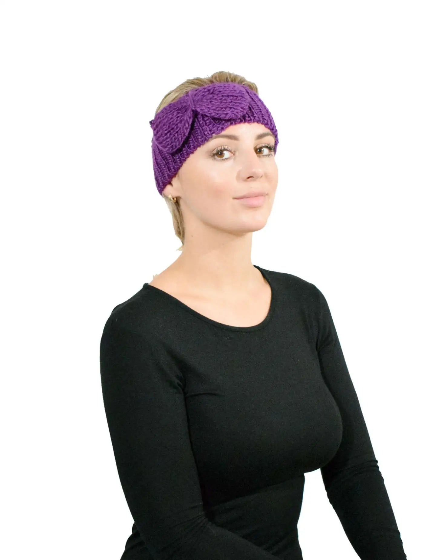 Woman wearing a purple headband with bow detail, perfect for Autumn & Winter.