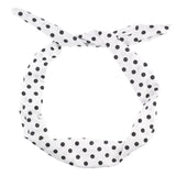Bunny ears retro polka dot wire headband with white and black print.
