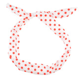 White and red polka dot print headband displayed in Bunny Ears Retro Polka Dot Wire Headband