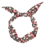 Floral bunny headband with retro rose print and bunny ears.
