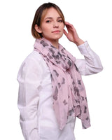 Woman wearing pink scarf with butterfly print oversized Viscose shawl for women.