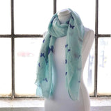 Butterfly Print Oversized Viscose Shawl Wrap for Women featuring draped mannequin with blue scarf.