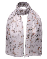 Light-colored butterfly print scarf featuring a delicate butterfly pattern design