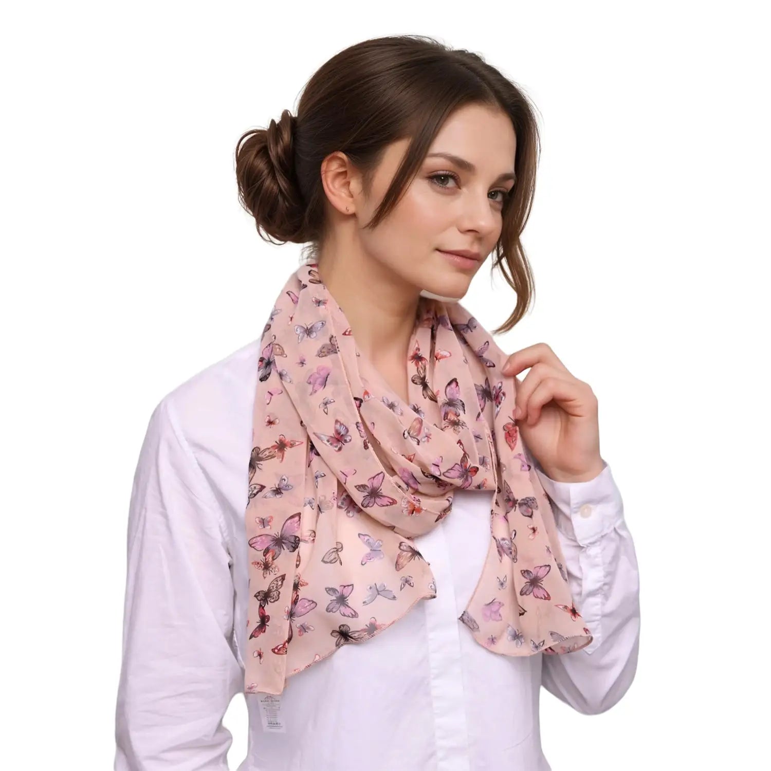 Woman wearing a pink butterfly print scarf loosely around her neck for stylish appeal