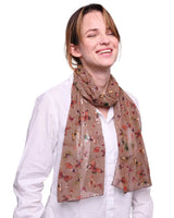 Butterfly print scarf: Woman wearing floral pattern scarf